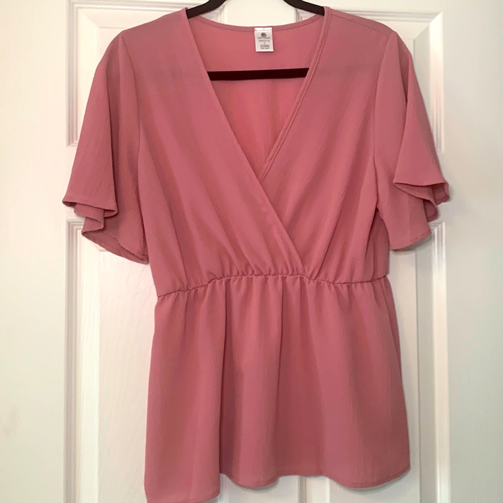 Pink blouse with elastic synched empire waist.